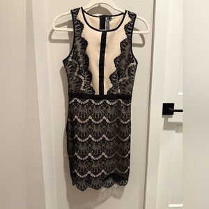 Size S dress with nude color with black lace details